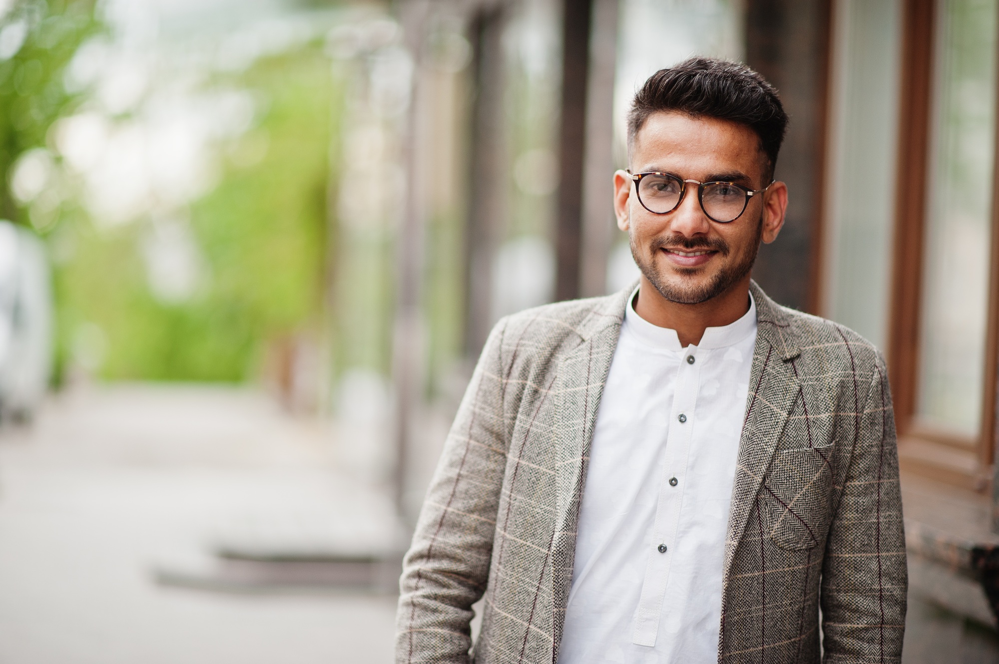 Stylish pakistani man wear in eyeglasses and jacket.